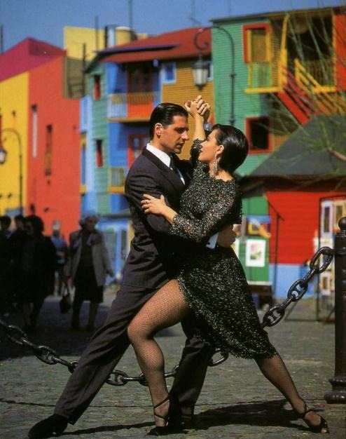 A person and person dancing on a streetAI-generated content may be incorrect.