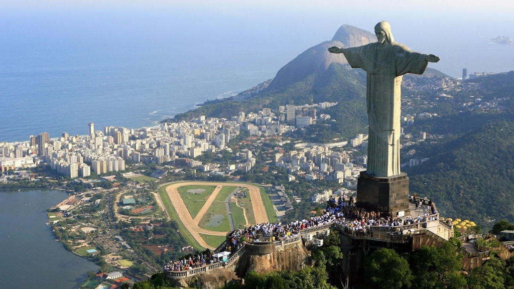 A statue of person on a mountain AI-generated content may be incorrect.